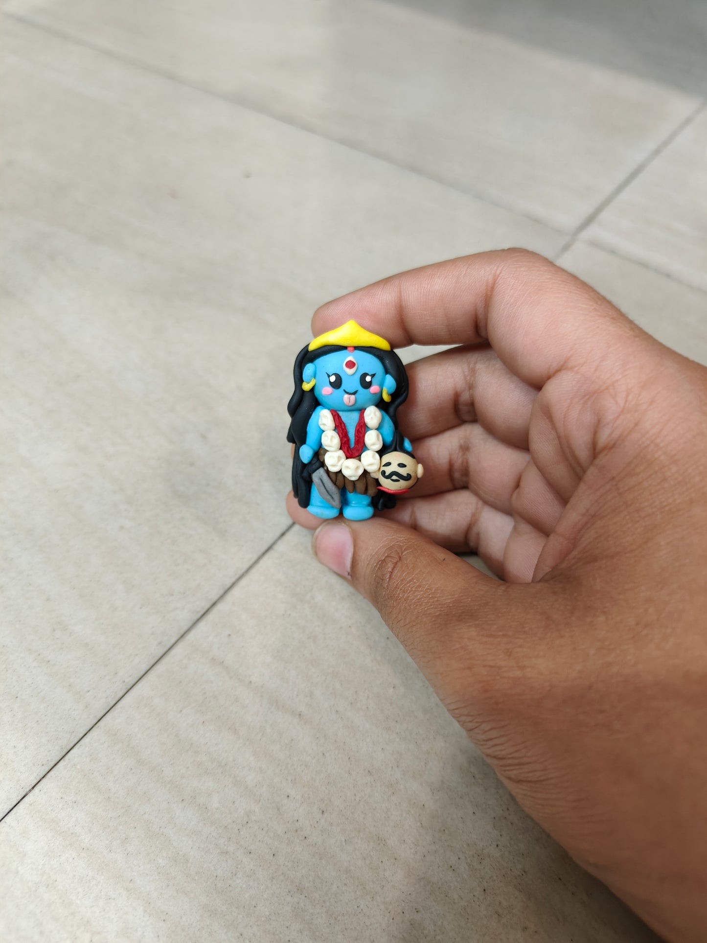 Baby Kali figure, figurine, doll, miniature