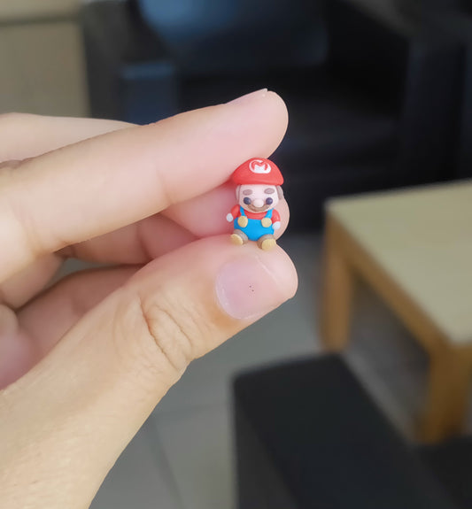 Micro miniature Mario doll
