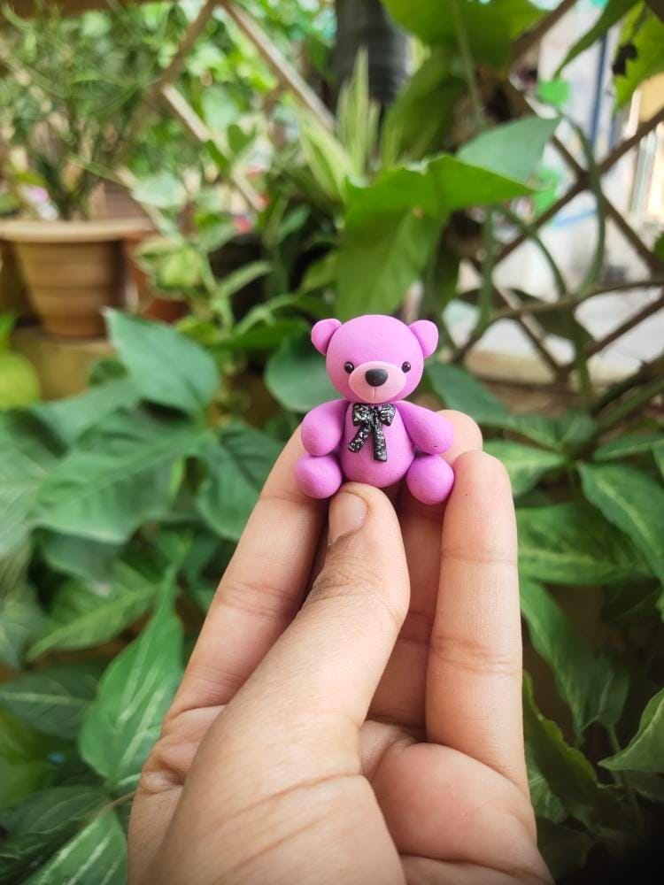 Miniature Teddy bear desk buddy, hyper-realistic collectible