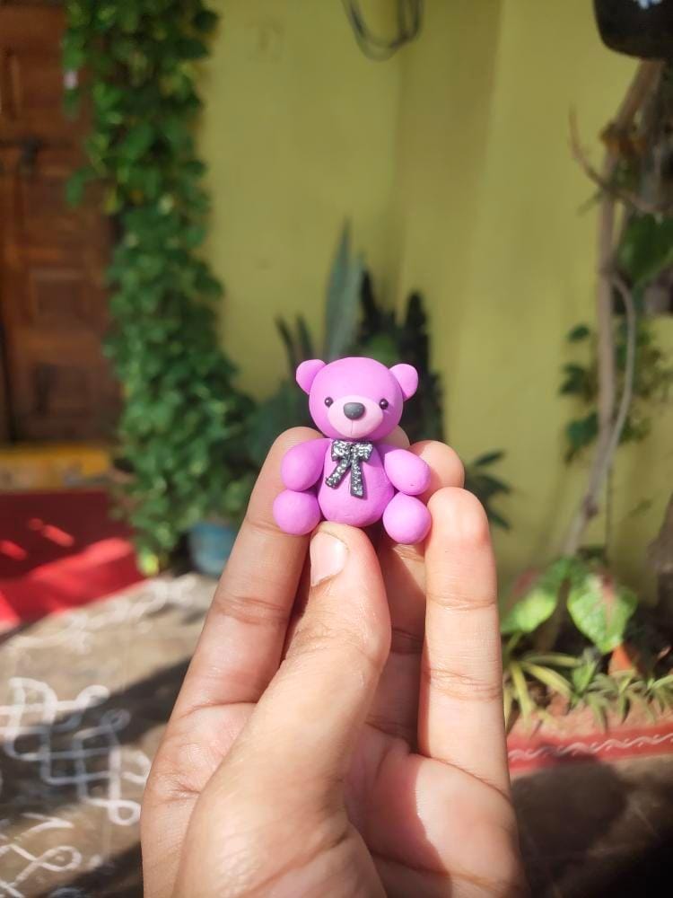 Miniature Teddy bear desk buddy, hyper-realistic collectible