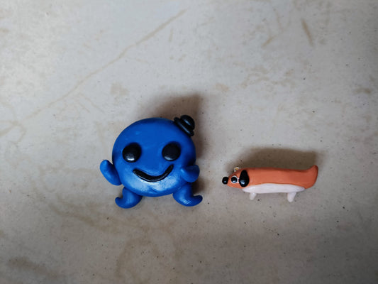 Oswald and Weenie Brooch, pins, broaches