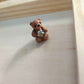 Miniature bears with flowers